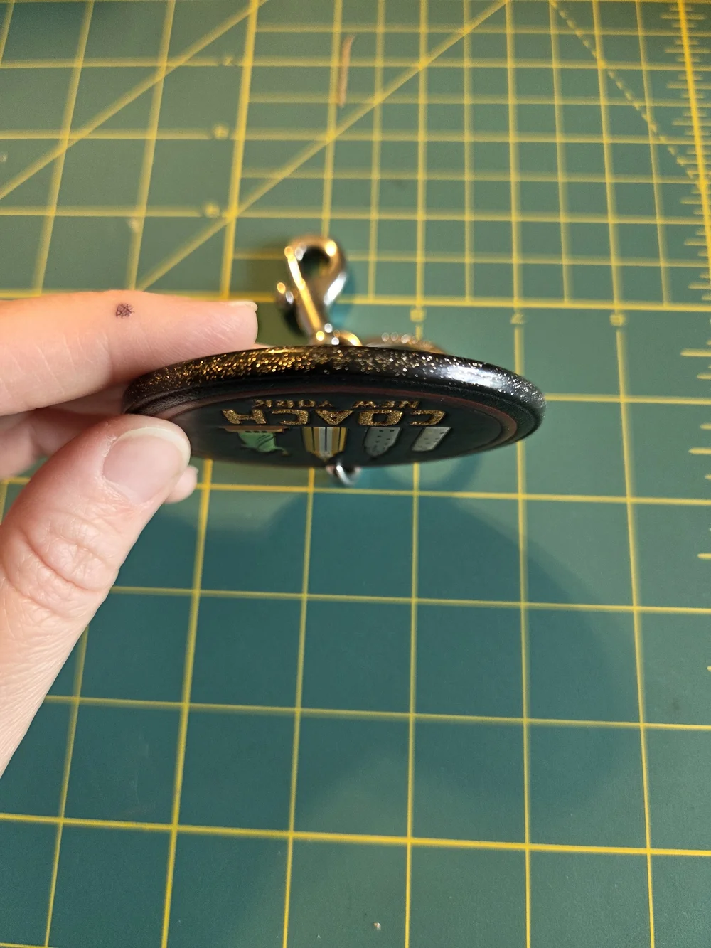 COACH New York Round Leather Keychain - Black with Gold Accents